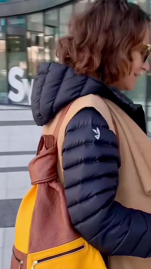 Brown Yellow leather Backpack on a woman